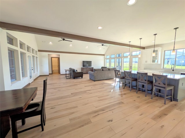 585 Dayton St SE, Ronan, MT 59864 - living room featuring french doors, a ceiling fan, light wood finished floors, plenty of natural light, and recessed lighting