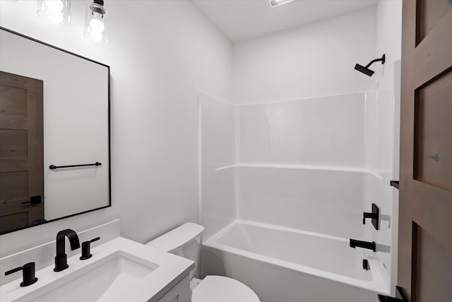 full bathroom featuring vanity, toilet, and bathtub / shower combination