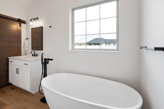 585 Dayton St SE, Ronan, MT 59864 - bathroom featuring a freestanding tub and vanity