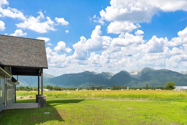 property view of mountains featuring a rural view