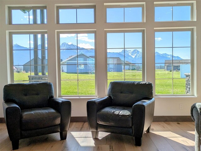 585 Dayton St SE, Ronan, MT 59864 - sitting room featuring healthy amount of natural light and wood-type flooring