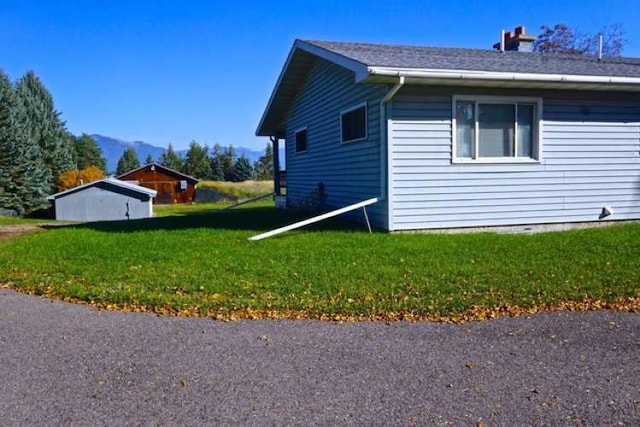 view of home's exterior featuring a yard