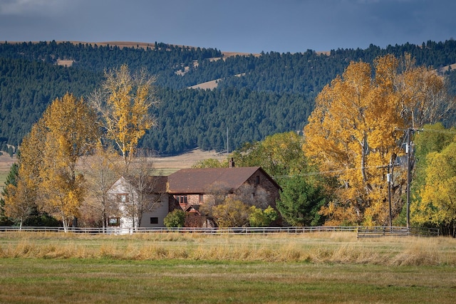 mountain view featuring a view of trees