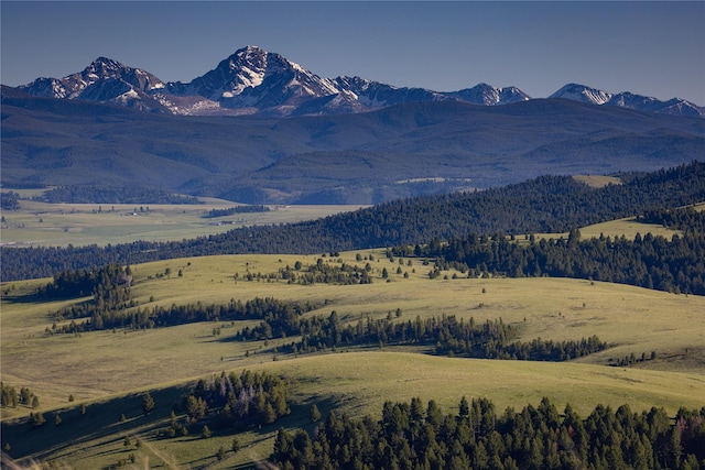 view of mountain feature featuring a rural view