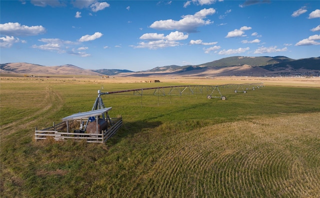 mountain view featuring a rural view