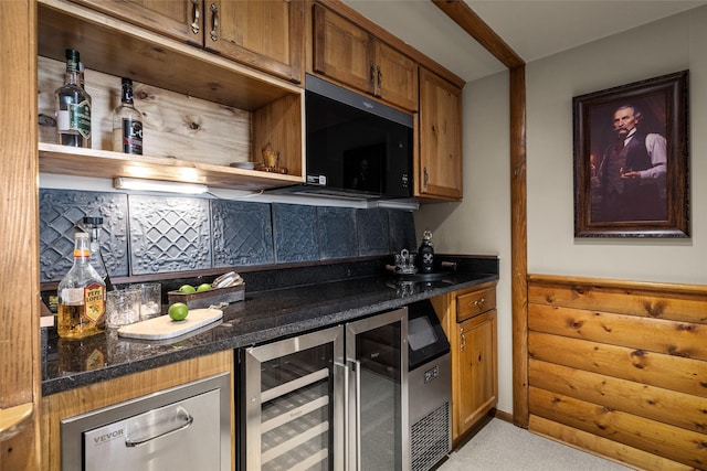 417 Sirucek Ln, Kalispell, MT 59901 - indoor dry bar featuring black microwave, tasteful backsplash, wine cooler, light carpet, and rustic walls