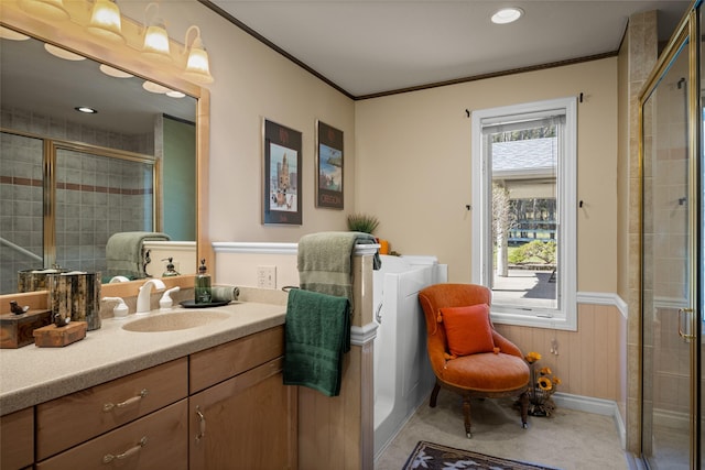 417 Sirucek Ln, Kalispell, MT 59901 - bathroom with vanity, a shower stall, crown molding, recessed lighting, and a wainscoted wall