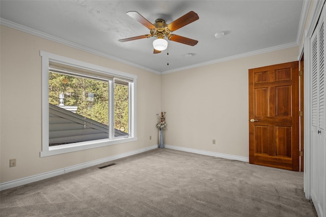 417 Sirucek Ln, Kalispell, MT 59901 - unfurnished room featuring crown molding, carpet flooring, ceiling fan, and a smoke detector