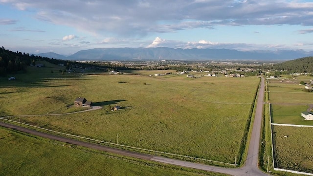 birds eye view of property featuring a rural view and a mountain view