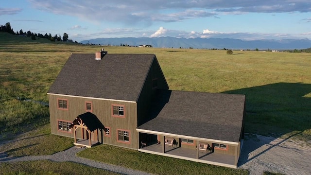 aerial view featuring a mountain view