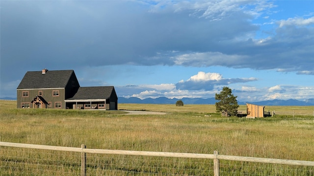 view of mountain feature featuring a rural view