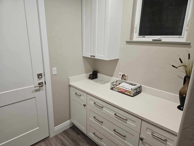 bathroom featuring wood-type flooring and vanity