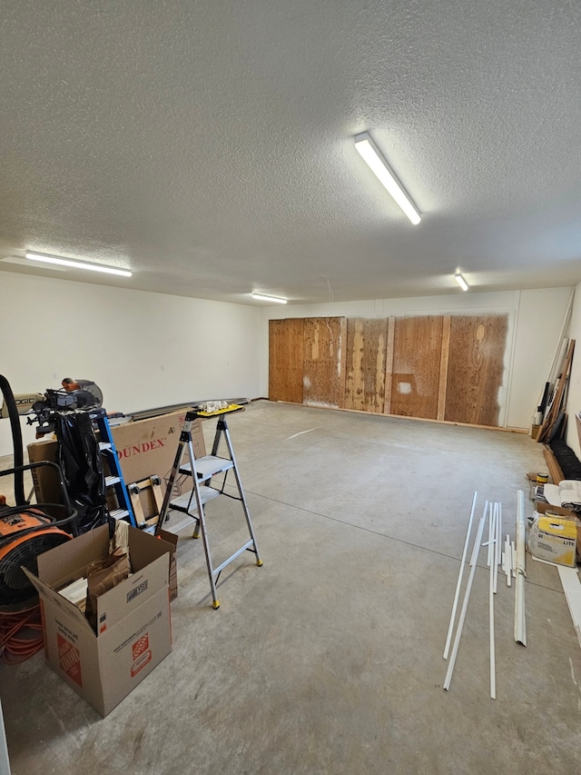 interior space featuring a textured ceiling