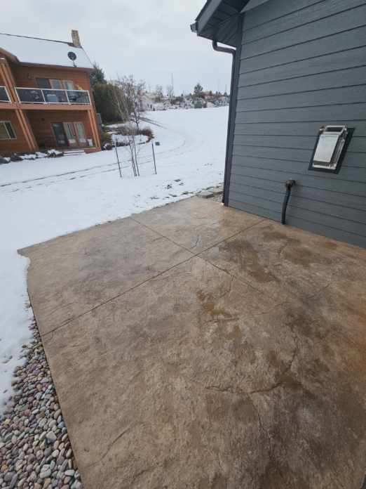 view of snow covered patio