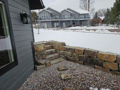 view of yard layered in snow