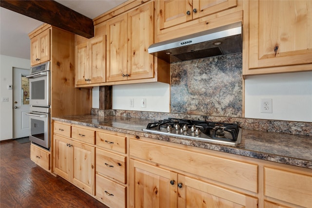 96 S Sanctuary Loop, Heron, MT 59844 - kitchen featuring under cabinet range hood, stainless steel appliances, light brown cabinetry, dark countertops, and dark wood-style flooring