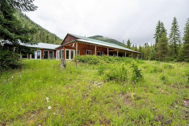 96 S Sanctuary Loop, Heron, MT 59844 - back of house with metal roof and french doors
