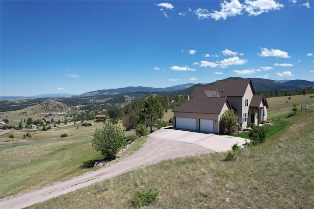 view of mountain feature featuring a rural view