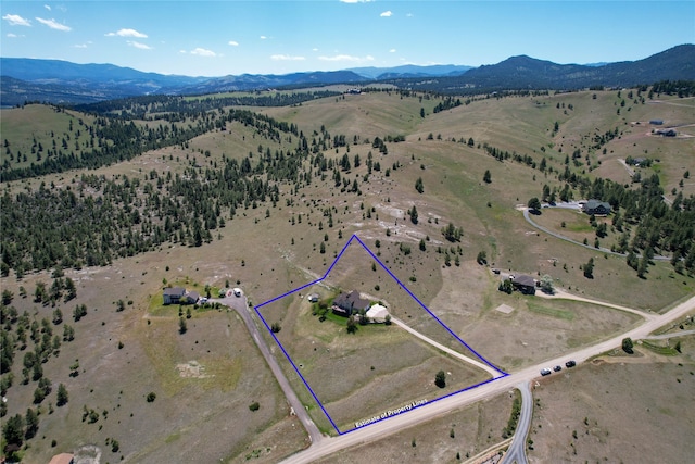 aerial view with a rural view and a mountain view