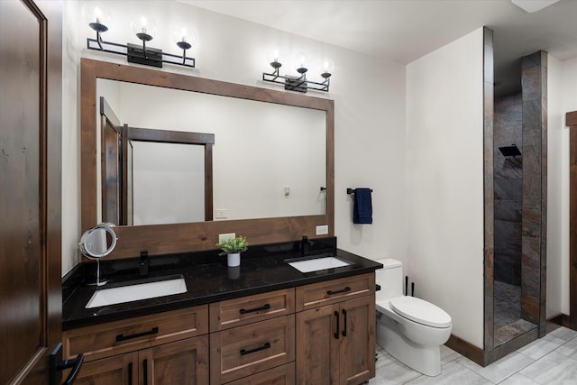 bathroom featuring walk in shower, vanity, toilet, and tile patterned flooring