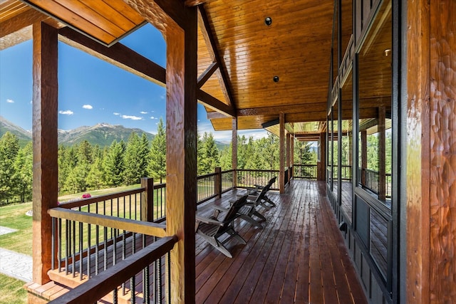 wooden terrace with a mountain view