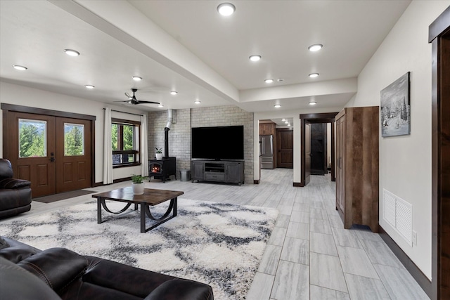 living room featuring a wood stove