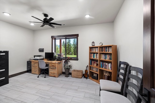 office area with ceiling fan