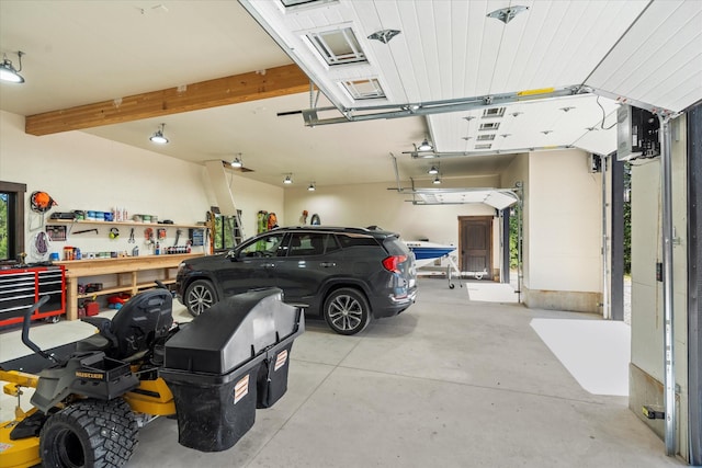 garage featuring a workshop area