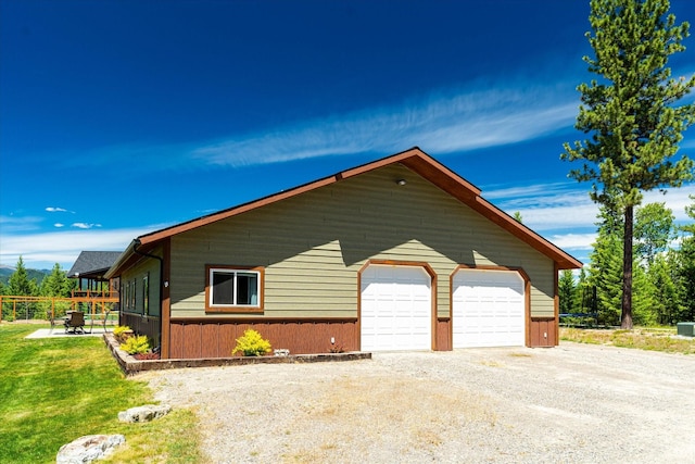 view of property exterior with a garage