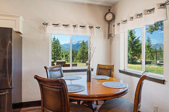 dining space with a mountain view