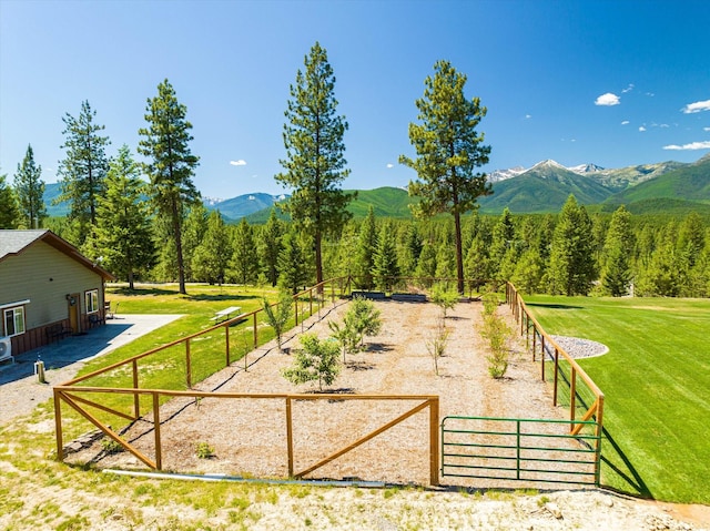 exterior space featuring a rural view and a mountain view