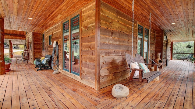 wooden terrace with covered porch