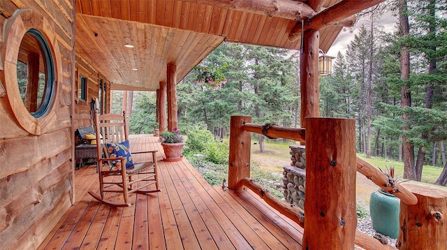 wooden terrace featuring a porch