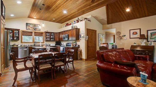 dining area featuring dark hardwood / wood-style floors, wooden ceiling, and high vaulted ceiling