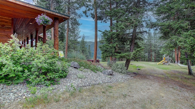 view of yard with a playground