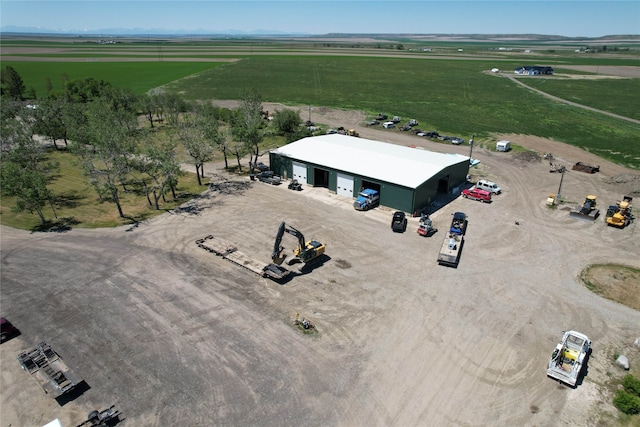 birds eye view of property featuring a rural view