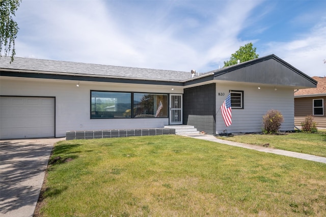 820 Bielenberg St, Deer Lodge, MT 59722 - single story home featuring a garage, a front yard, and concrete driveway