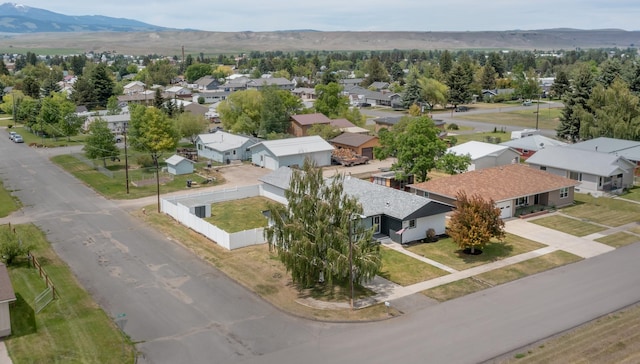 drone / aerial view featuring a mountain view