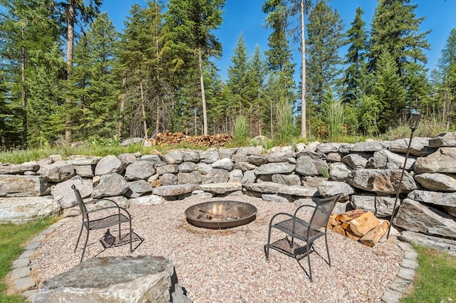 view of patio / terrace featuring a fire pit