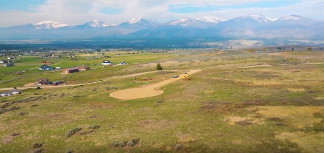 bird's eye view with a mountain view and a rural view