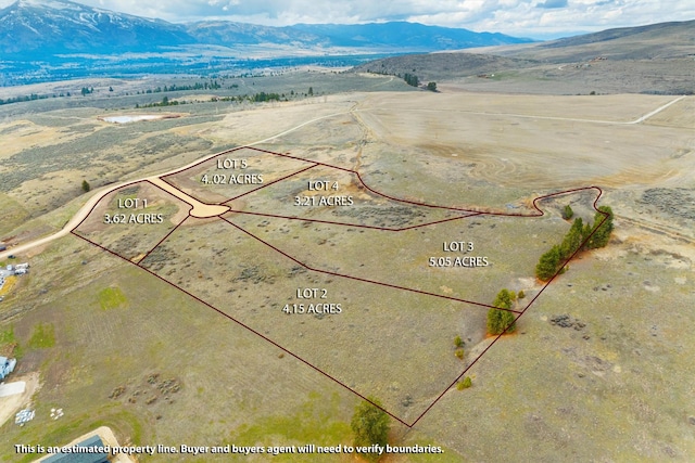 bird's eye view with a rural view and a mountain view