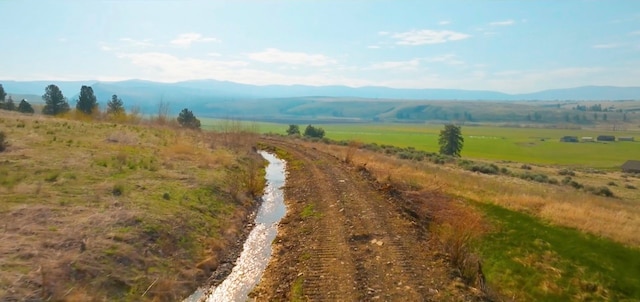 property view of mountains with a rural view