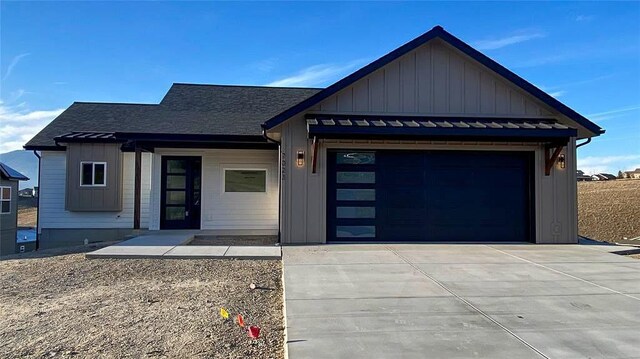 view of front of property with a garage