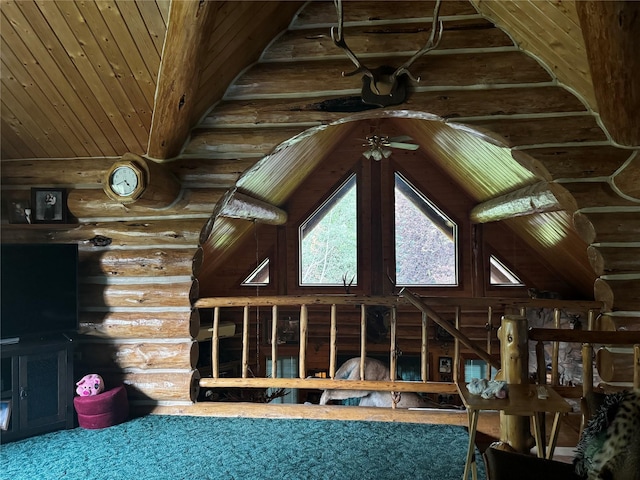 unfurnished living room featuring wooden ceiling and high vaulted ceiling