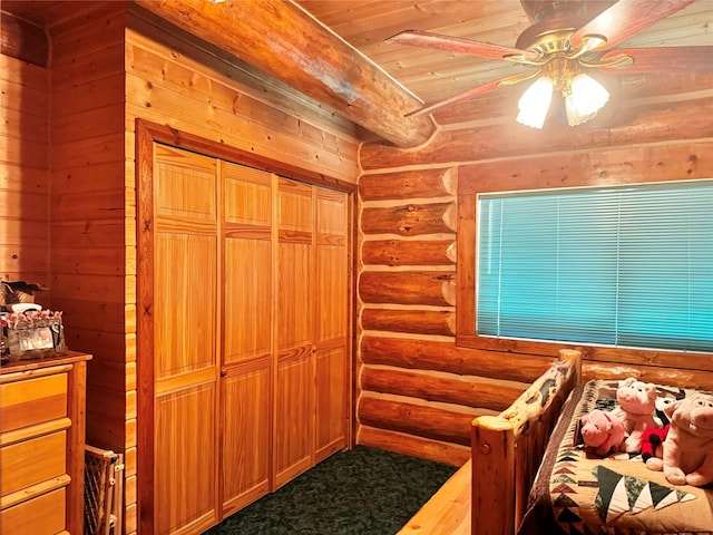 bedroom with log walls, ceiling fan, and wood ceiling