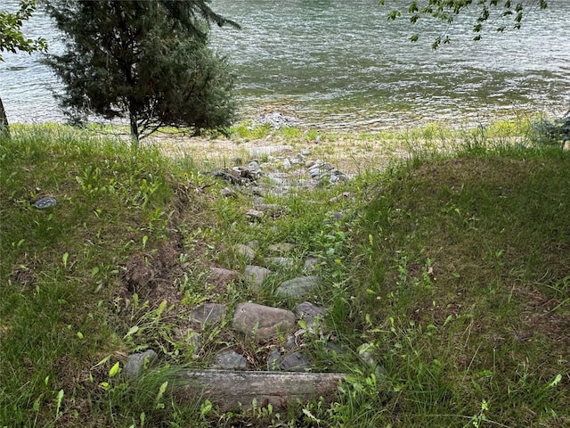 view of landscape with a water view