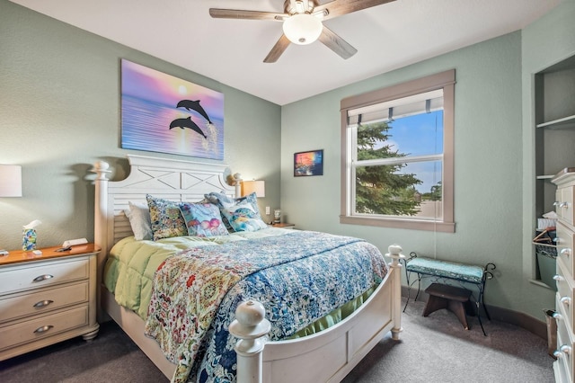 282 Mcwenneger Dr, Kalispell, MT 59901 - bedroom with dark colored carpet and a ceiling fan