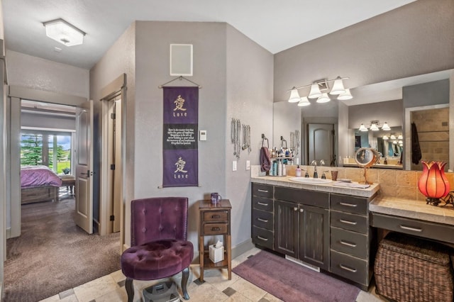 282 Mcwenneger Dr, Kalispell, MT 59901 - ensuite bathroom with vanity and a textured wall