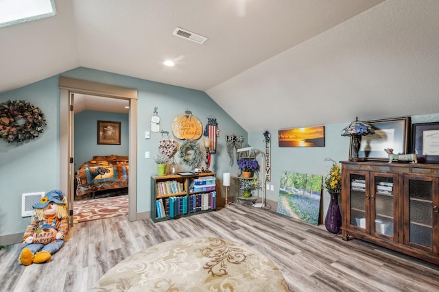 282 Mcwenneger Dr, Kalispell, MT 59901 - rec room featuring wood finished floors and vaulted ceiling