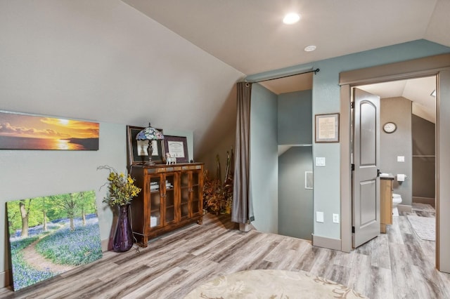 282 Mcwenneger Dr, Kalispell, MT 59901 - corridor with lofted ceiling and wood finished floors